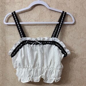 Indulge in Style White and Black Ruffled Women's Top(Bust 36”
Length 17”)
